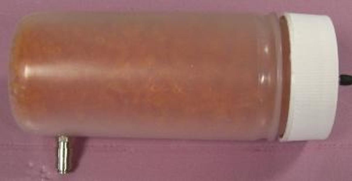 Used QTY. 1. NALGENE DESICCATE CONTAINER WITH DESICCATE.