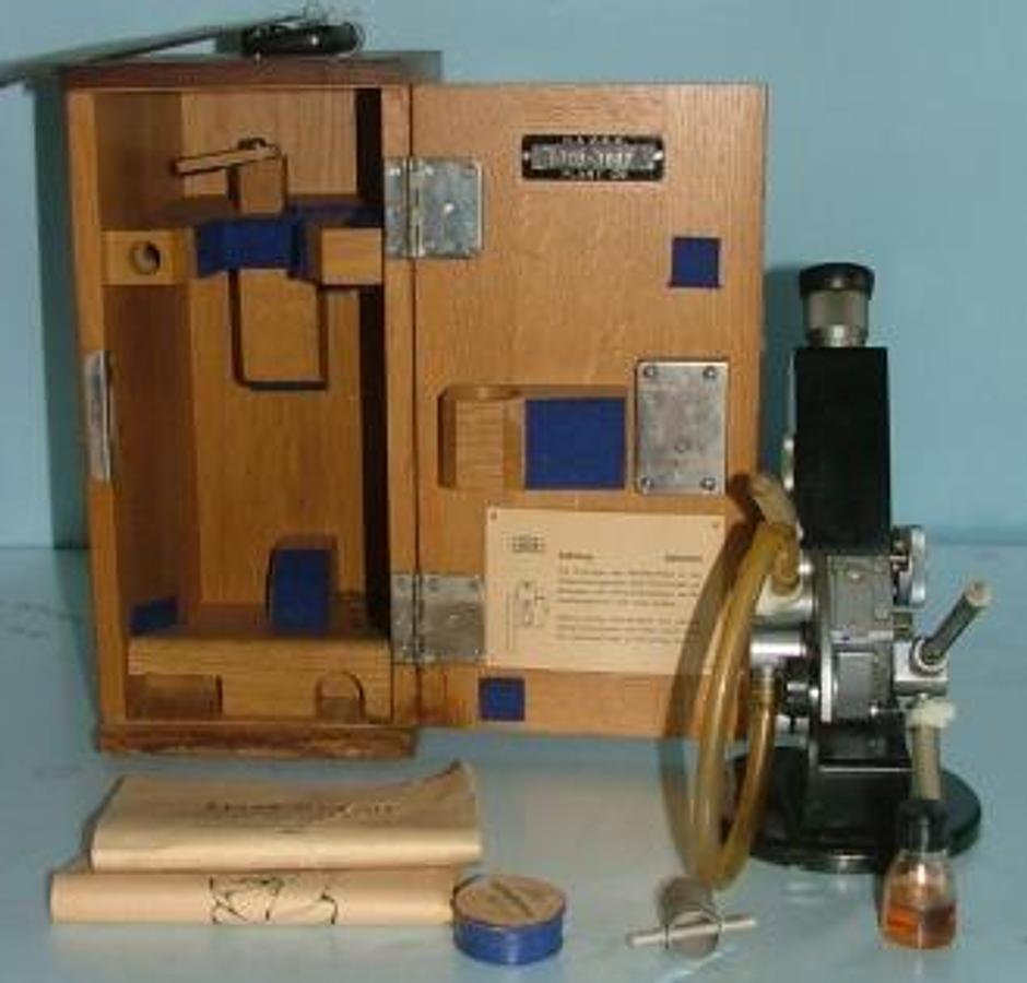 Used QTY. 1. ZEISS-OPTON REFRACTOMETER STANDARD MODEL WITH HEATING PRISM SCALE FOR REFRACTIVE INDEX MFGR'S SER NO 128321 WORK ORDER 930-0-2653-300 ENCLOSED IN WOODEN CARRYING CASE.