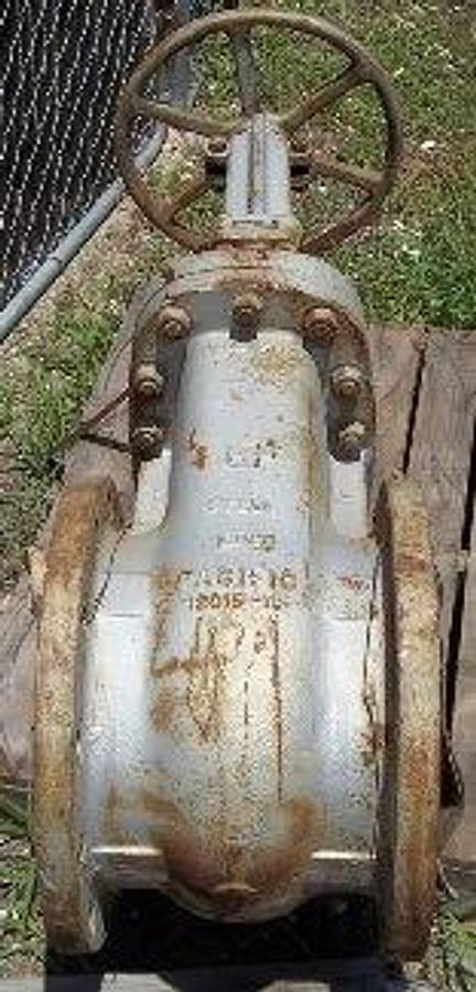 Used QTY. 1. PACIFIC 12" 150 FLANGED RAISED FACE GATE VALVE. WCB (WELD ABLE CARBON BODY). 12-150 STEEL 2M80 12G15-10.