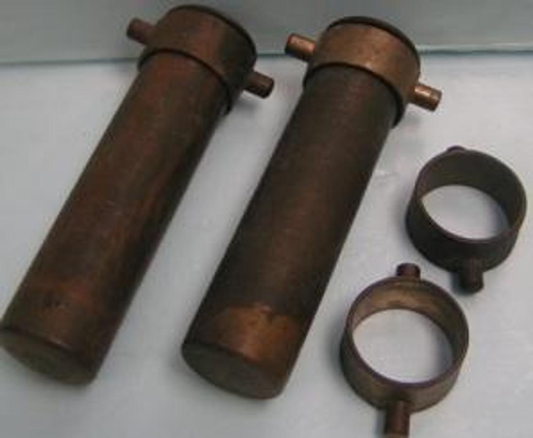 Used QTY. 2. BRASS CENTRIFUGE CUPS 1 ½ INCHES WIDE X 6 ¼ DEEP