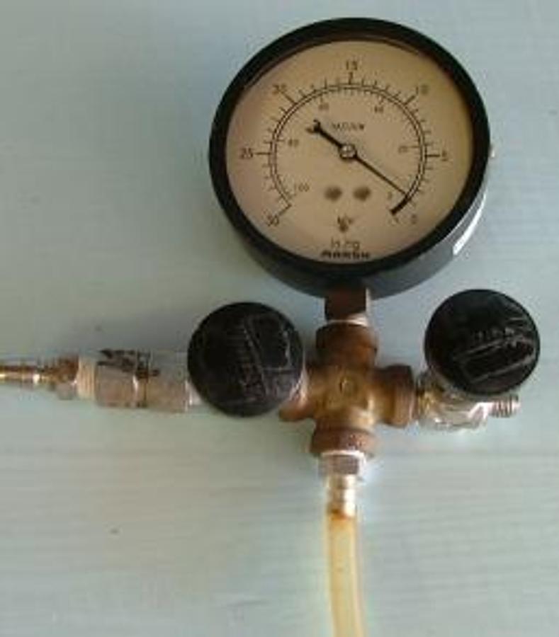 Used QTY. 1. GAUGE WITH 2 WATTS: VALVE PATENT 3955 647 LL A.