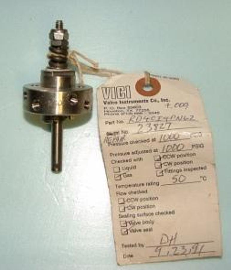 Used QTY. 1. VALCO VICI VALVE 4 PORT PART# RD4CI4PN62 REPAIR# 23827 1000 PSI TEMP RATING 50C.