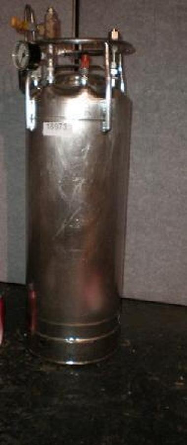 Used STAINLESS STEEL PRESSURE VESSEL (SAMPLE CAN) 28" TALL WITH PRESSURE GAUGE 0-30 AND 2 VALVES. VESSEL HAS PRESSURE SEALING TOP. IDEAL FOR CRUDE OIL SAMPLING.