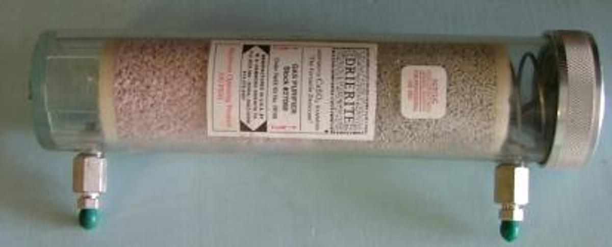 Used DRIERITE: GAS PURIFIER STOCK# 27068 ORDER REFILL KIT NO. RF68 ANHYDROUS CASO4 HAMMOND "THE VERSATILE DESICCANT" "ACRYLIC: AVOID CONTACT WITH ORGANIC SOLVENTS" MAXIMUM OPERATING PRESSURE 100 PSIG 11 Â¼ " LONG 2 Â½ " OD