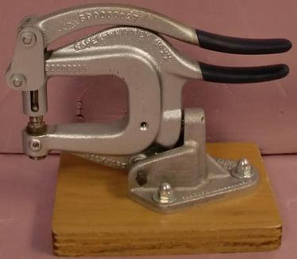 Used ROPER-WHITNEY 110XX METAL HOLE PUNCH MOUNTED ON WOODEN BASE SRN 53800002780000014.