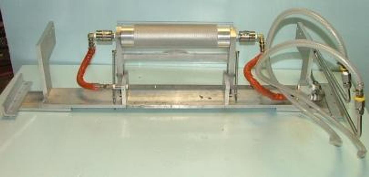 Used SHEET ROLL APPRATUS 3" X 13" WITH HIGH PRESSURE ROTARY UNIONS. ALUMINUM CONSTRUCTION WITH PLEXIGLASS GUARD.