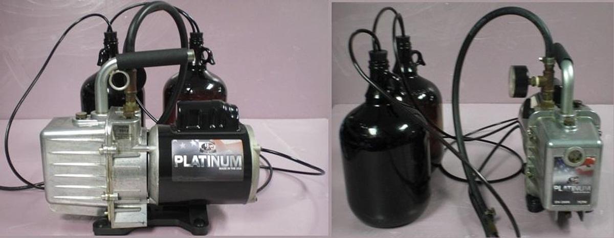 Used JUST BETTER PLATINUM SERIES VACUUM PUMP DV-200 N WITH HOSE AND 2 ONE GALLON AMBER JUGS