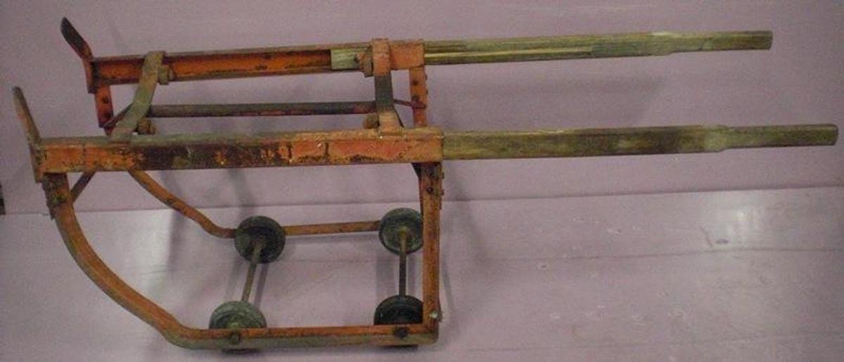 Used 4 WHEEL 55 GALLON BARREL DOLLY WITH EXTENDABLE HANDLES.