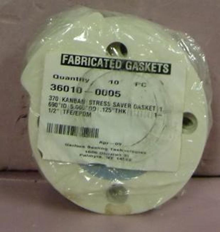 Used GARLOCK FABRICATING TECHNOLOGIES 370 KANBAN STRESS SAVER GASKET PT NO. 36010-0051.690" I.D. 5.000" O.D. .125" THK 1-1/2" TFE/EPDM NEW CONDITION IN ORIGINAL PACKAGING.