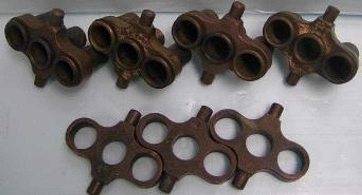 Used BRASS CENTRIFUGE CUPS 11/16 OF AN INCH WIDE X 5/8 OF AN INCH DEEP