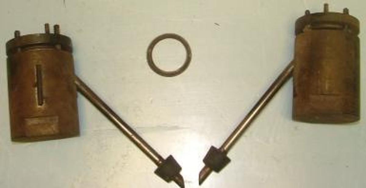 Used QTY. 2. REACTOR VESSELS WITH SPOUT HEIGHT 5 1/8 SPOUT 8IN/ 2 1/8 DIAMETER DEPTH 3 3/8.