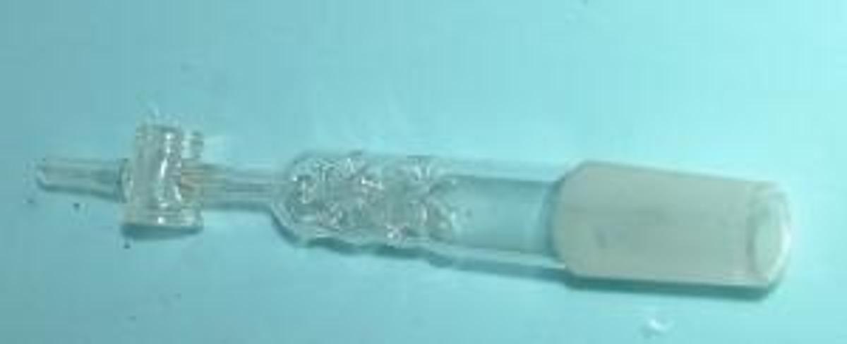 Used QTY. 1. LARGE FILTER STRAIGHT TUBE W/ 24/40 MALE END W/ RUBBER HOSE END W/ GLASS VALVE W/O VALVE.