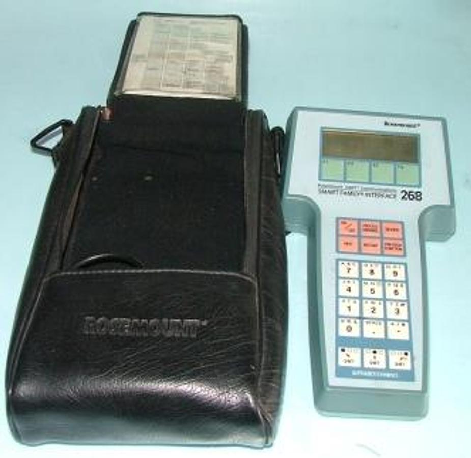 Used QTY. 1. ROSEMOUNT HART COMMUNICATIONS SMART FAMILY INTERFACE 268 MODEL 268 P/N 00268-1049-2 SERIAL NO 53196 268 AD9E 00268-1030-0002 REV G WITH CASE AND MENU TREE W/ CORDS