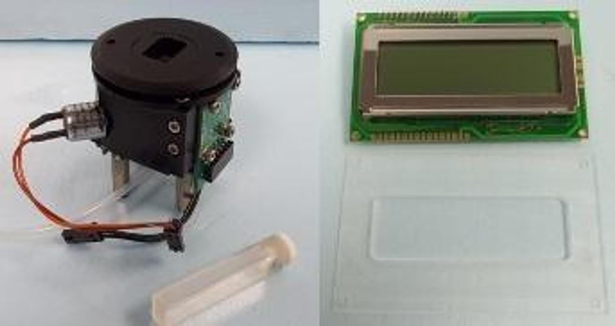 Used PETROSPEC BY PAC QUICK SPEC ETHANOL PURITY ANALYZER PARTS CONSISTING OF: 1. ETHANOL DETECTOR #M101Z W/ SAMPLE INSERT (SOC) AND DISPLAY SCREEN #L2034 W/ COVER.