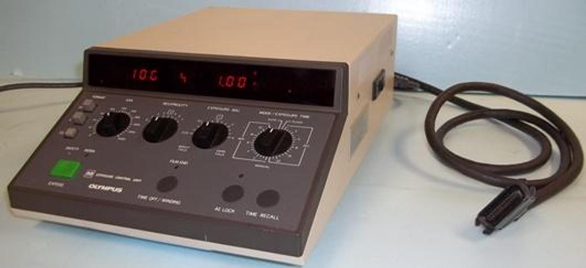 Used QTY. 1. OLYMPUS EXPOSURE CONTROL UNIT (PM-CBAD) NO. 408002 100-115V 7-.6A 50-60HZ WITH PM LS3 CARD AND PM PBS CARD W/ CABLE PLUS PM-1VM CARD.