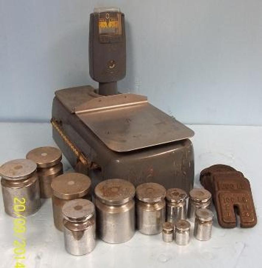 Used QTY. 1. TOLEDO SCALE MODEL: 3021 SERIAL: 4614 FACTORY NO: 3021-0-037E CAPACITY: 20LB INCLUDES LOT OF 16 WEIGHTS: (4) 10LBS