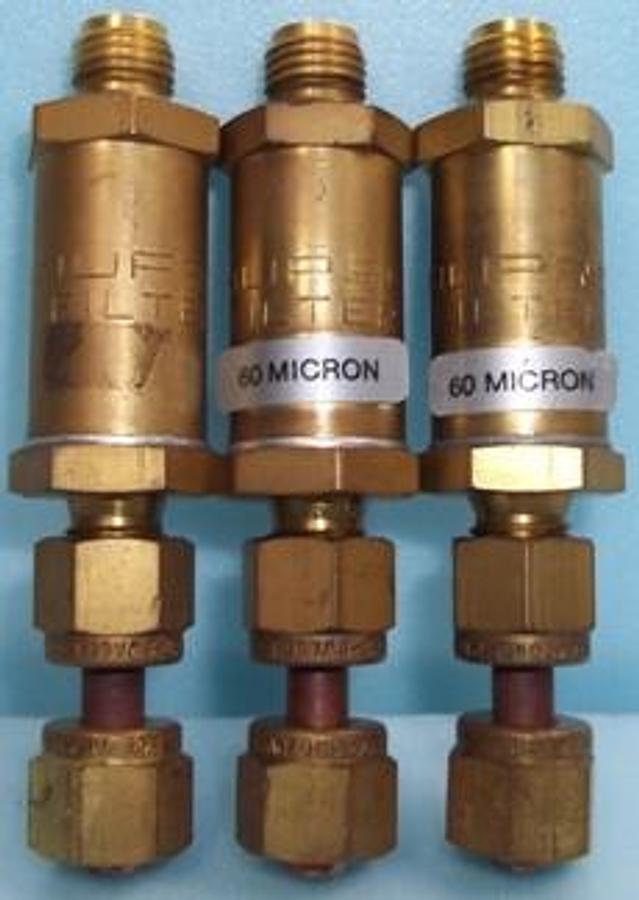 Used QTY. 3. NUPRO 60 MICRON BRASS FILTER CARTRIDGE.