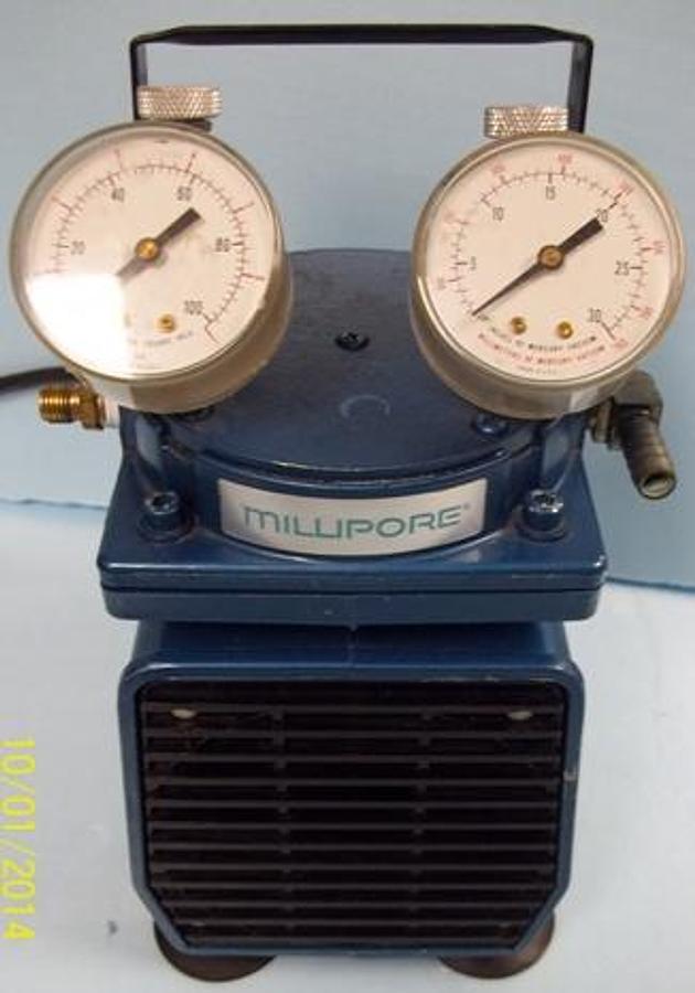 Used QTY. 1. MILLIPORE OIL LESS VACUUM PUMP WITH PRESSURE GAUGE AND VACUUM GAUGE MODEL: XX5500000