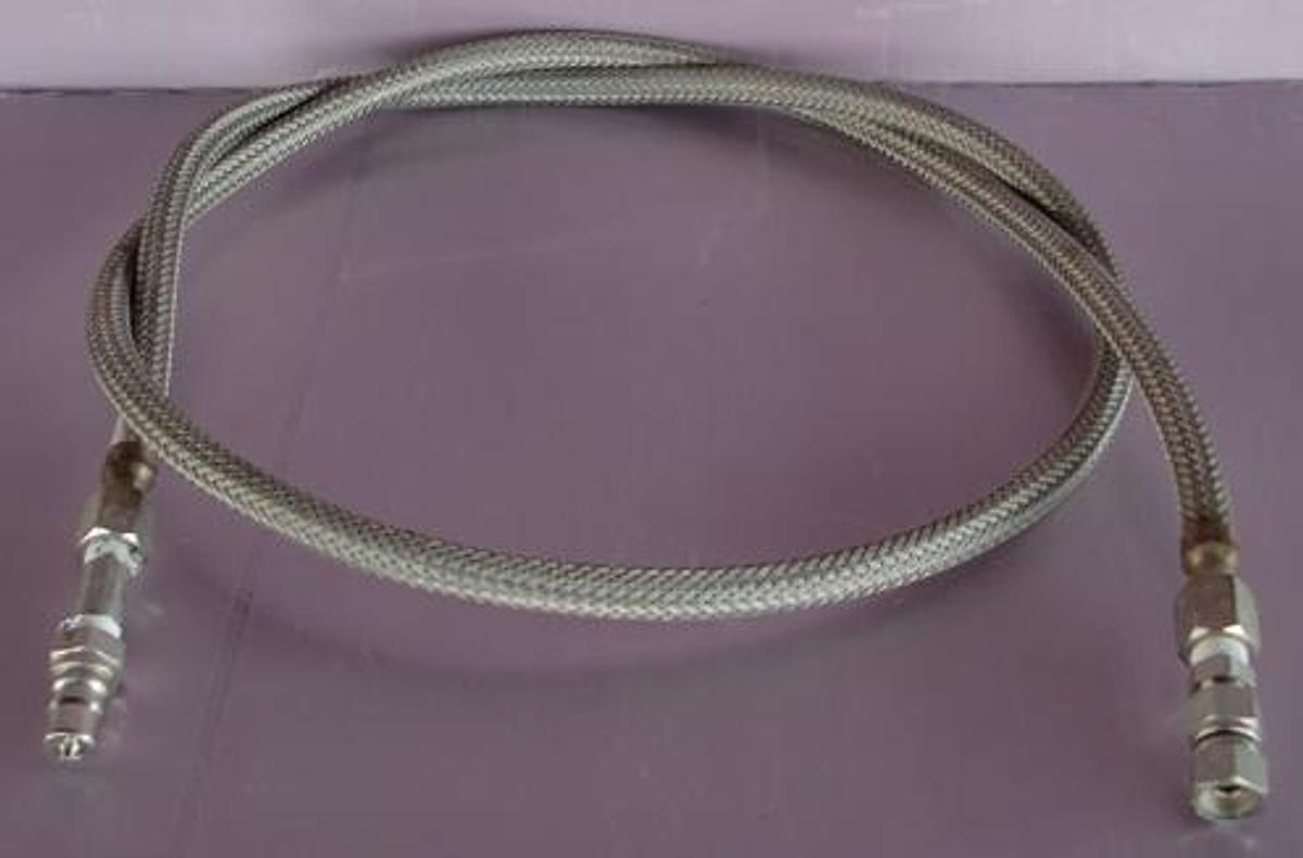 Used QTY. 1. 70" BRAIDED STAINLESS STEEL METAL FLEX HOSE