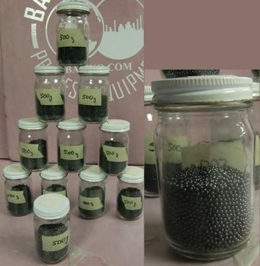Used QTY. 12. SMALL JARS W/LIDS CONTAINING 500G (500 GRAMS TOTAL INCLUDING JAR) (JAR WEIGHS 94 G) OF LEAD SHOT LABORATORY GRADE.