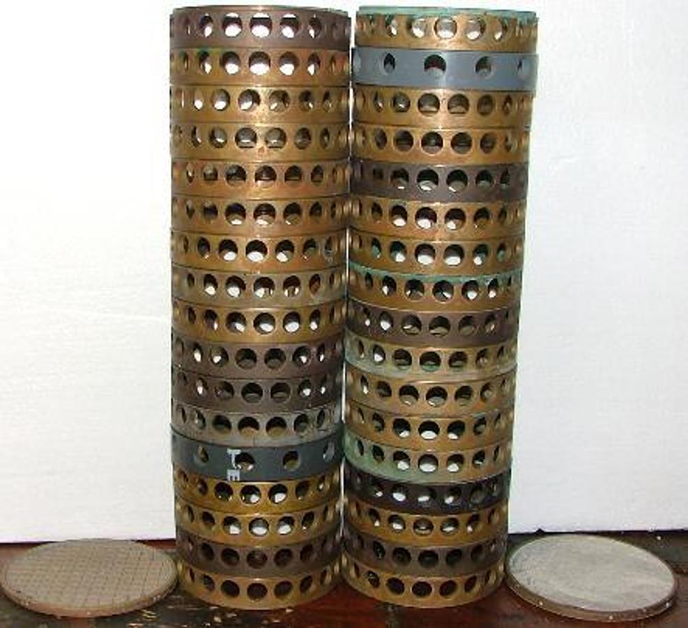 Used QTY. 34. BRASS RINGS 5-3/4" I.D. WITH 2 SCREENS AND 52 REFLECTIVE STEEL CIRCLES.