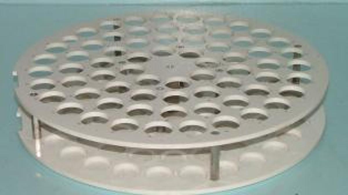 Used QTY. 1. SAMPLE TRAY (TRAY ONLY) TRAY FOR AN AUTO SAMPLER WITH SIXTY EIGHT NUMBERED TEST TUBE SLOTS. 13 ¼ IN DIAMETER WITH 6 POSITIONING NIPPLES ON THE BOTTOM.