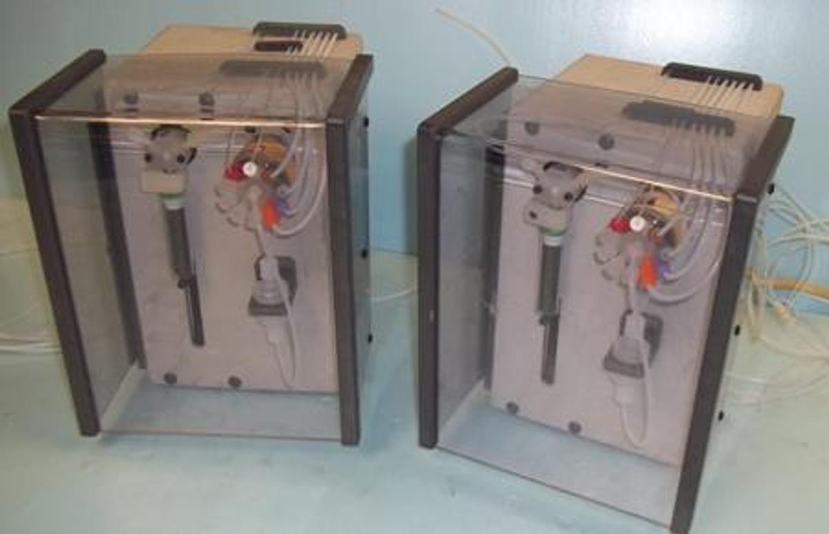 Used CHEMINERT 10 PORT VALVE SYRINGE PUMPS NPD0160 L AND NPD0162 L WITH CARVO KLOEHN 10 ML SYRINGES.