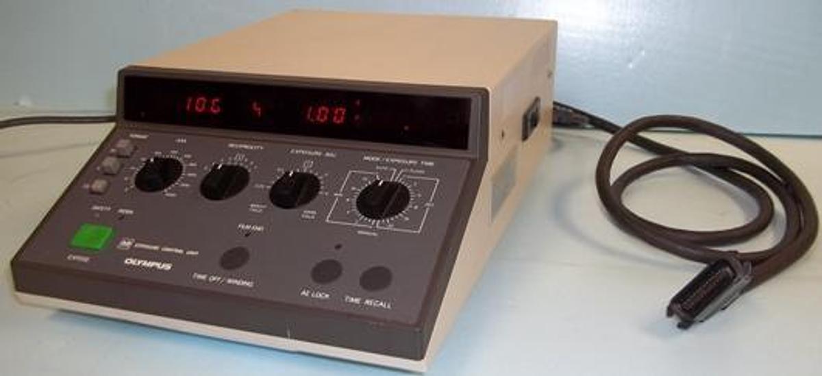 Used OLYMPUS EXPOSURE CONTROL UNIT (PM-CBAD) NO. 408002 100-115V 7-.6A 50-60HZ WITH PM LS3 CARD AND PM PBS CARD W/ CABLE PLUS PM-1VM CARD.