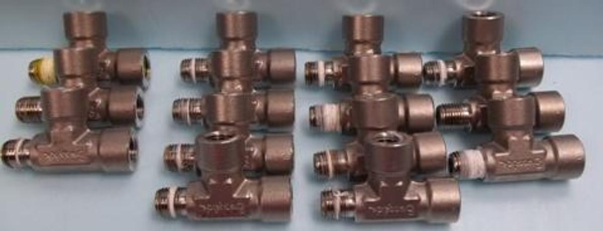 Used SWAGELOK ½ INCH TEE FITTING DOUBLE FEMALE SINGLE MALE.