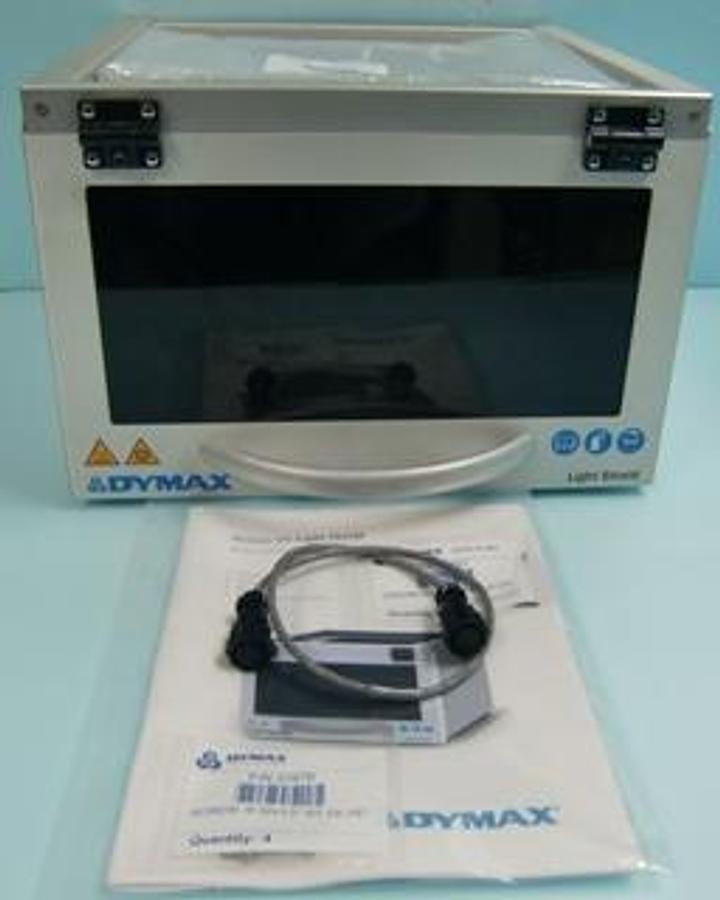 Used DYMAX UV LIGHT SHIELD MODEL NO. EC LIGHTSHIELD 24V DC 0.3S MFG DATE: 10/22/14 SRN. 3001980 WITH 1. DYMAX PLATE