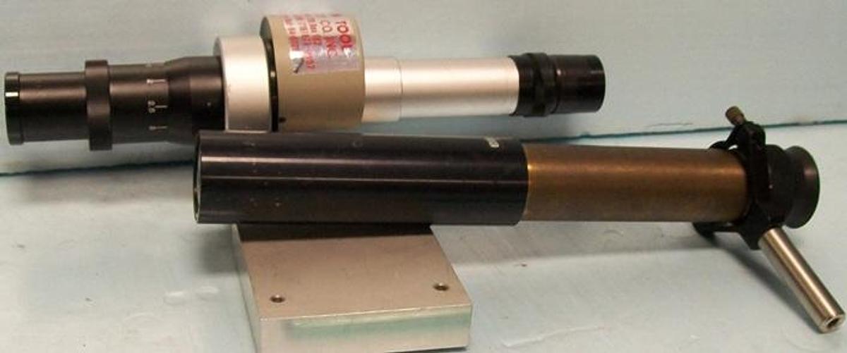 Used QTY. 2. MICROSCOPE LENS' (1) NO MAGNIFICATION LISTED (1) W. 20X TITAN 0.75-3 WITH 2X TITAN ON MOUNT.
