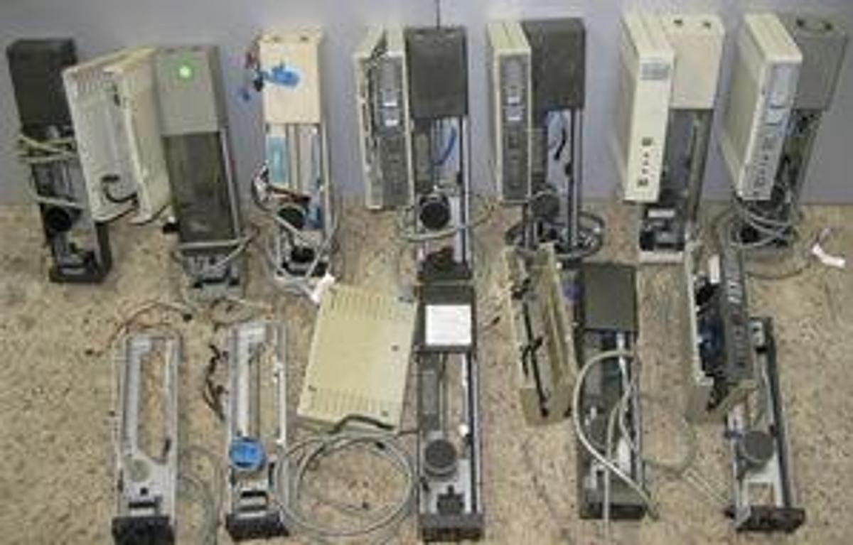 Used QTY. 12. HEWLETT PACKARD 7673 A AND B AUTO SAMPLER TOWER PARTS. .
