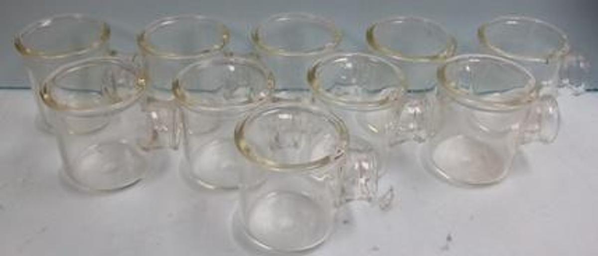 Used PYREX GLASS 2" GLASS PIPE WITH 4"X 5" BOWL BEADED ENDS.