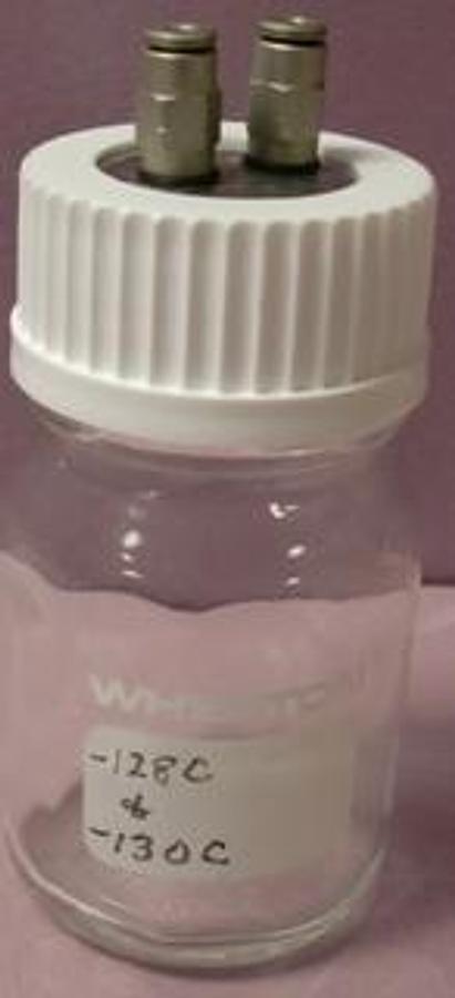 Used 100ML WHEATON JAR WITH AIR IN AND OUT CAP FOR COLUMBUS INSTRUMENTS.