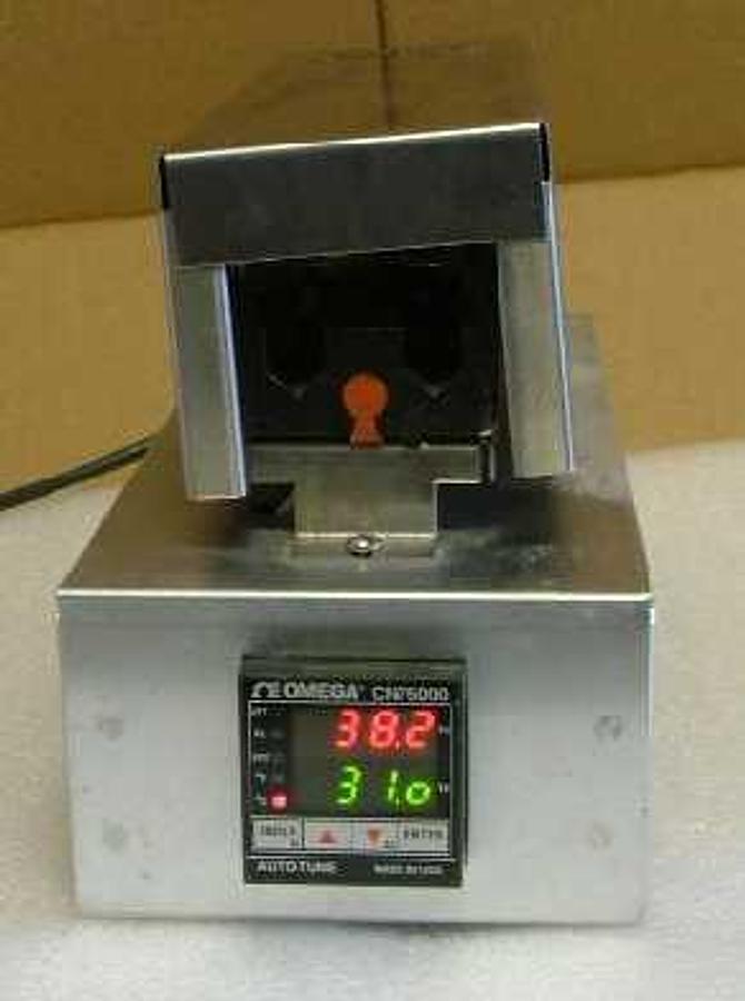 Used QTY. 1. HEATING BLOCK WITH STAINLESS STEEL HOUSING AND OMEGA MODEL: CN76000