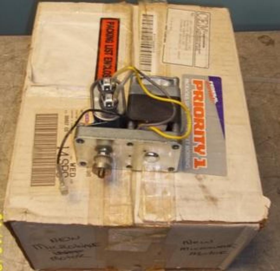 Used QTY. 1. CEM MDS 2100 MICROWAVE MOTOR AND CAPACITOR DRIVING A SPROCKET.