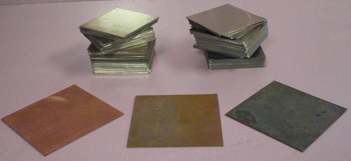 Used POLISHED STAINLESS STEEL 4" X 4" PLATES. WITH 2 COPPER.