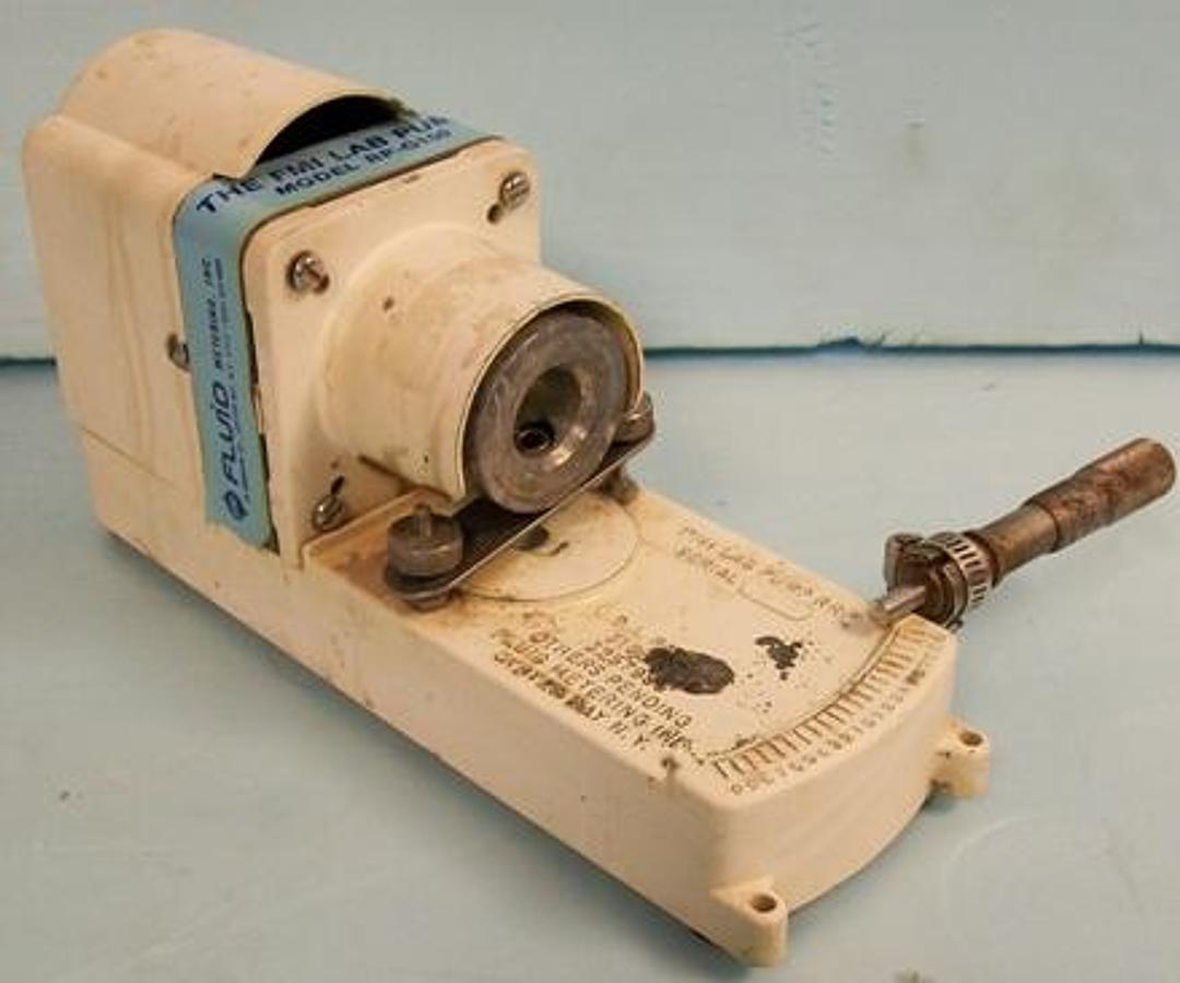 Used QTY. 1. FLUID METERING INC