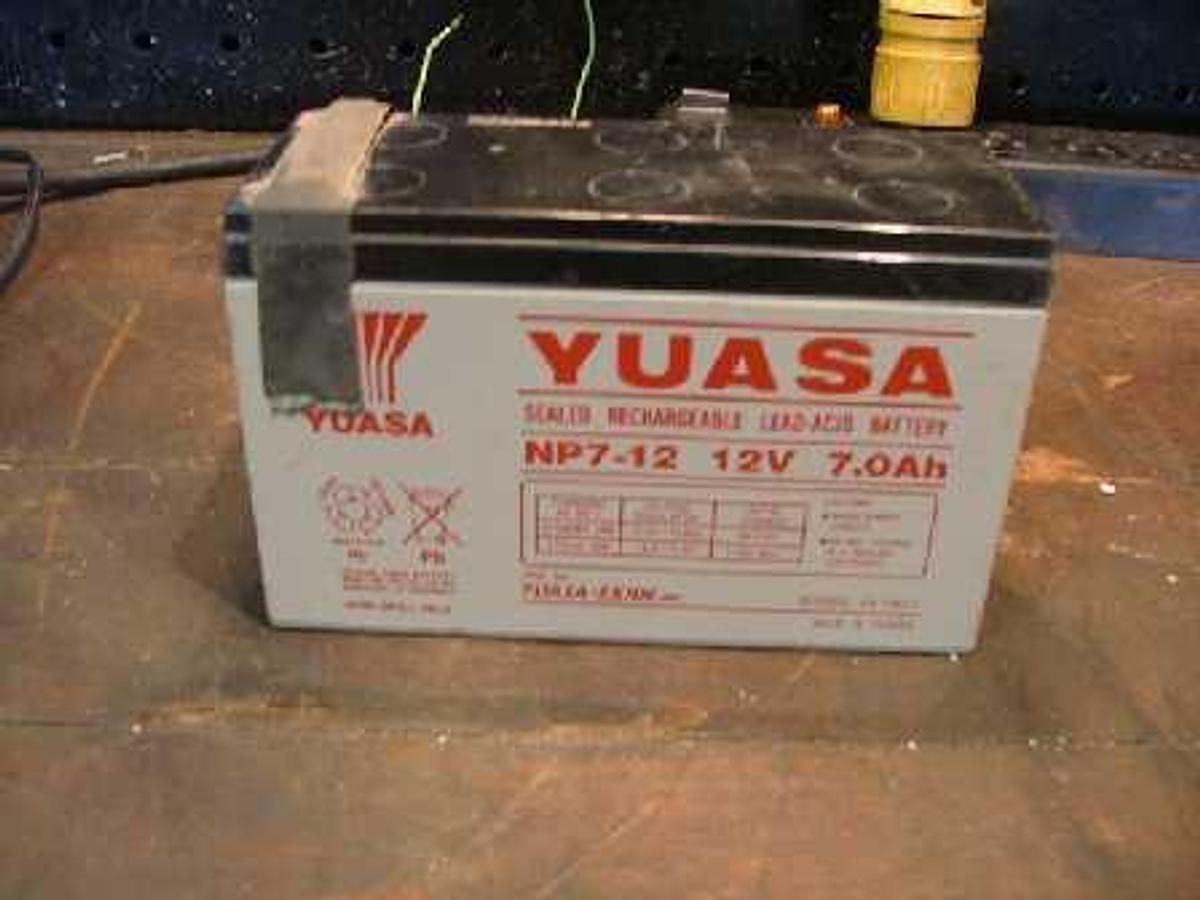 Used QTY. 1. YUASA NON-SPILL ABLE SEALED RECHARGEABLE LEAD-ACID BATTERY