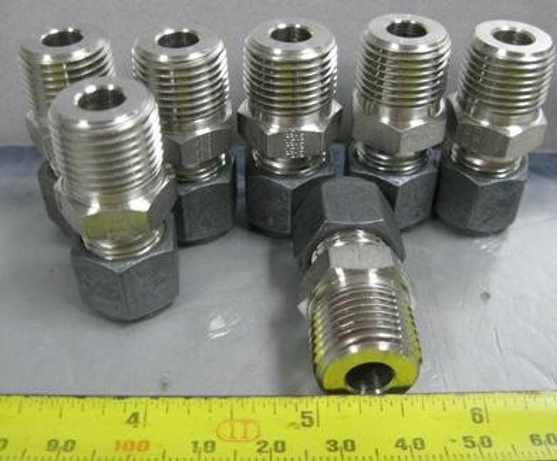 Used QTY. 7. PARKER 3/8 TUBE X 3/8 MNPT