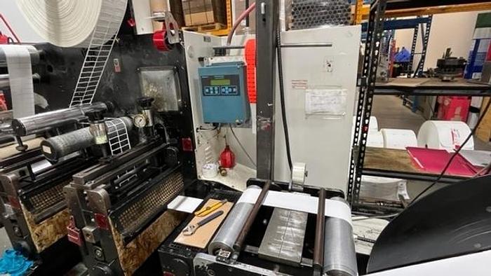 Used 13" WIDE ROTOFLEX SLITTER REWINDER WITH 2 STATION DIE CUTTING