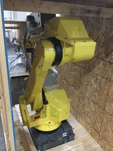 Used 2012 FANUC M-710iC/50 WITH R-30iA CONTROLS WITH CONVEYOR SYSTEM  (NEW NEVER USED)