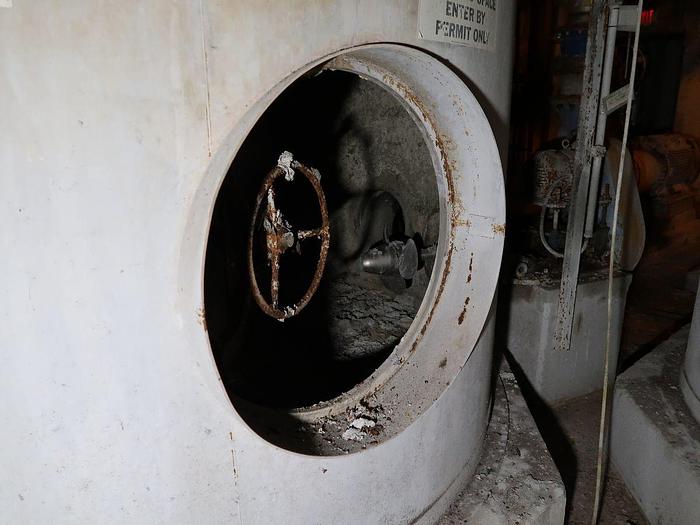 Used APACHE 9' DIA. X 15' HIGH T-316L SS  WITH AGITATOR 7138 GALLONS